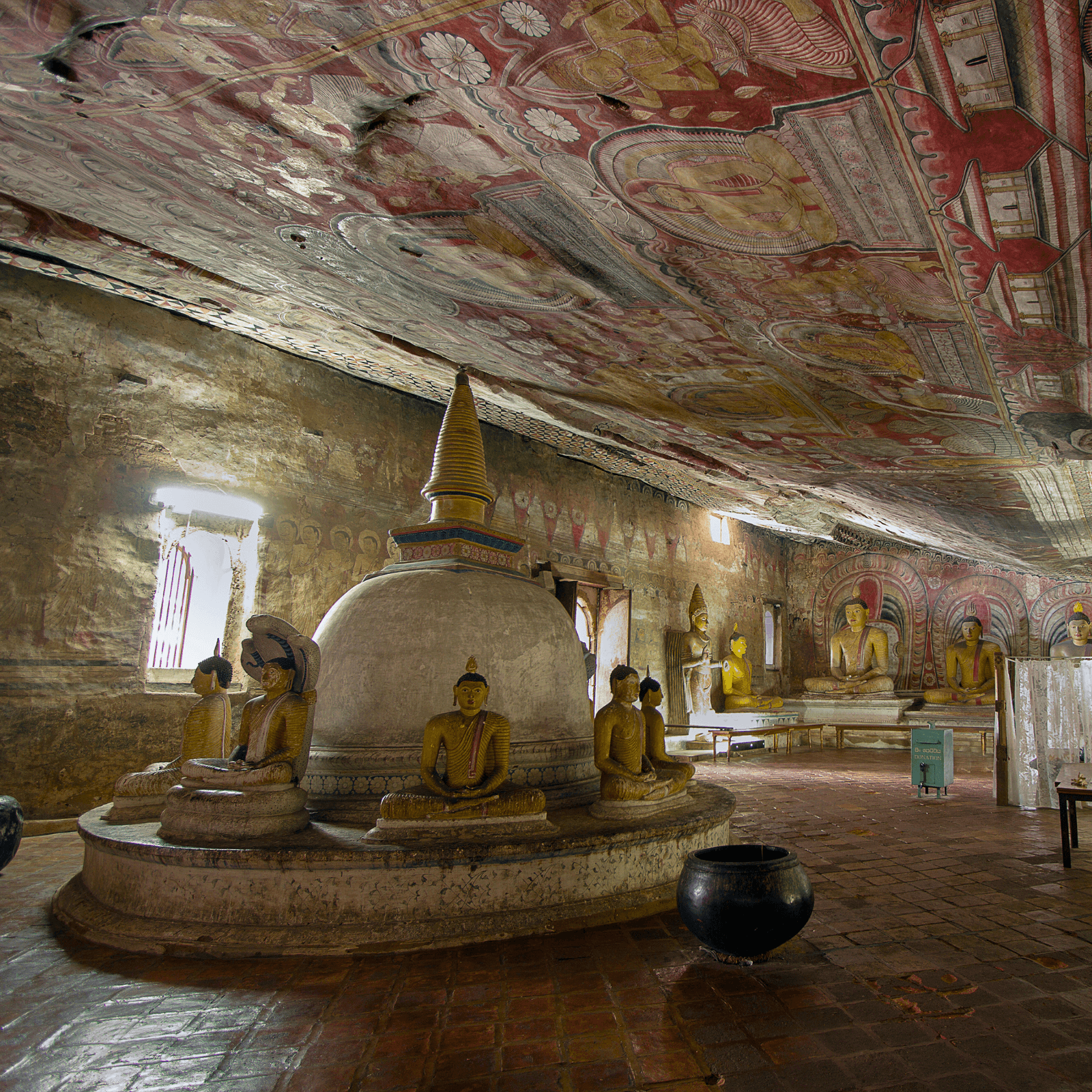 Experience the majesty of the Dambulla Cave Temple, where you'll delve into a cave complex adorned with ancient murals and statues that trace back to Sri Lanka's rich historical tapestry.