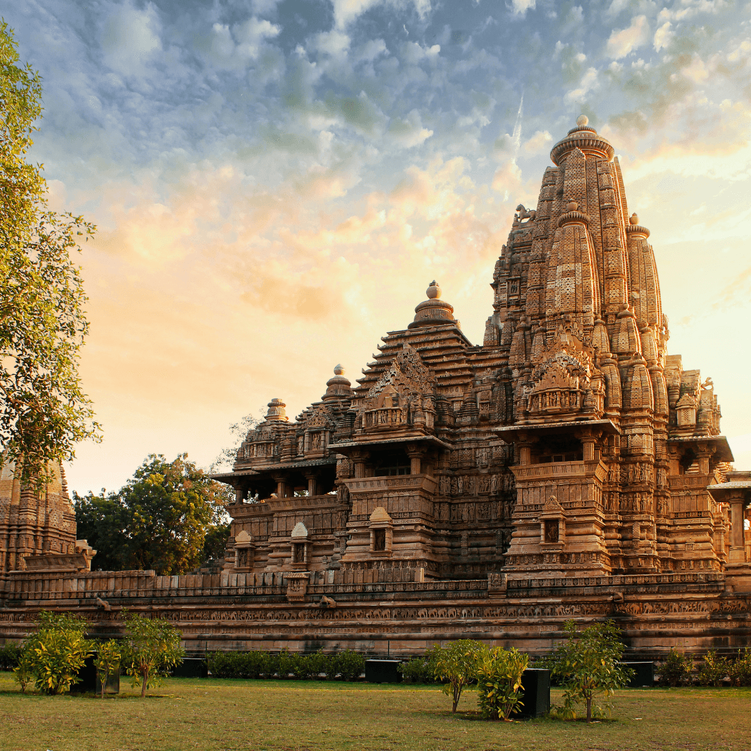 Visit the Western Group of Temples in Khajuraho, a stunning example of Indian art and architecture with intricate carvings that showcase the craftsmanship of ancient builders.