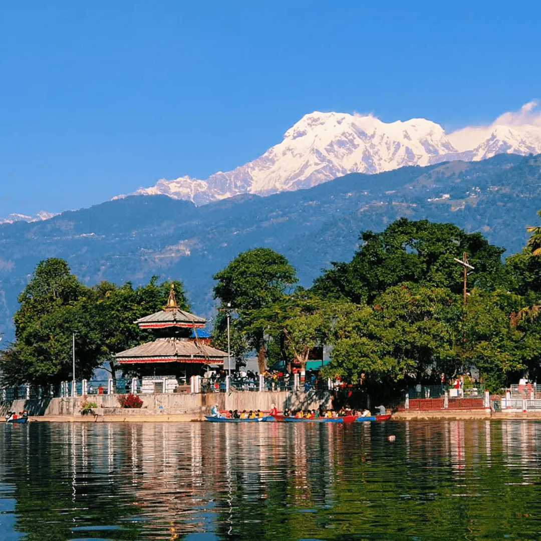 Relish the tranquility of Fewa Lake as you boat to Barahi Temple, surrounded by water and watched over by the Annapurna range, creating a perfect harmony of nature and spirituality.