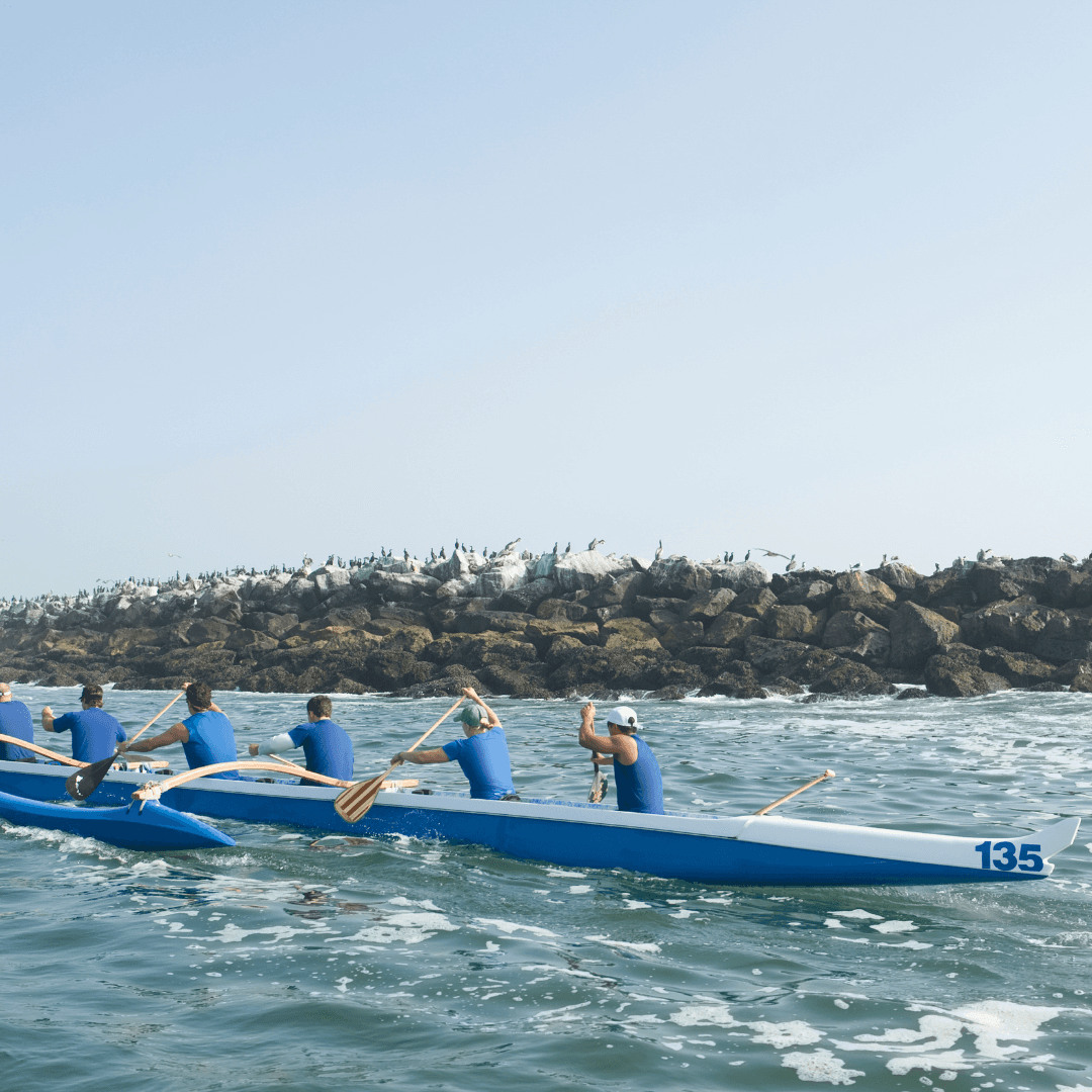 Experience El Nido's Secret Beach, a hidden paradise accessible only by swimming through a narrow crevice, surrounded by imposing limestone cliffs.