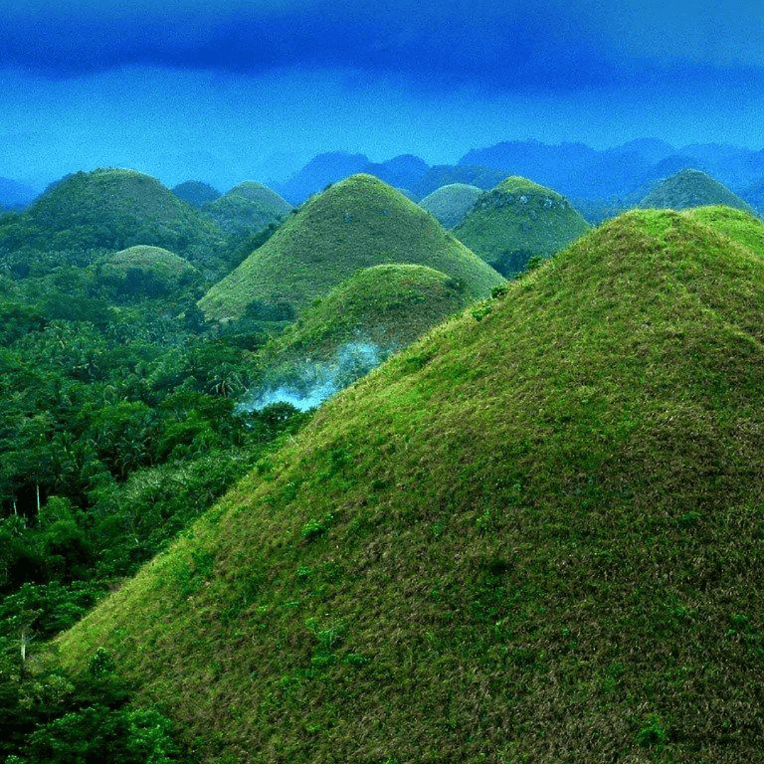 Bohol Countryside Charm Discover Bohol’s cultural essence, featuring the historic Blood Compact Shrine, Baclayon Church, and the magical Chocolate Hills.