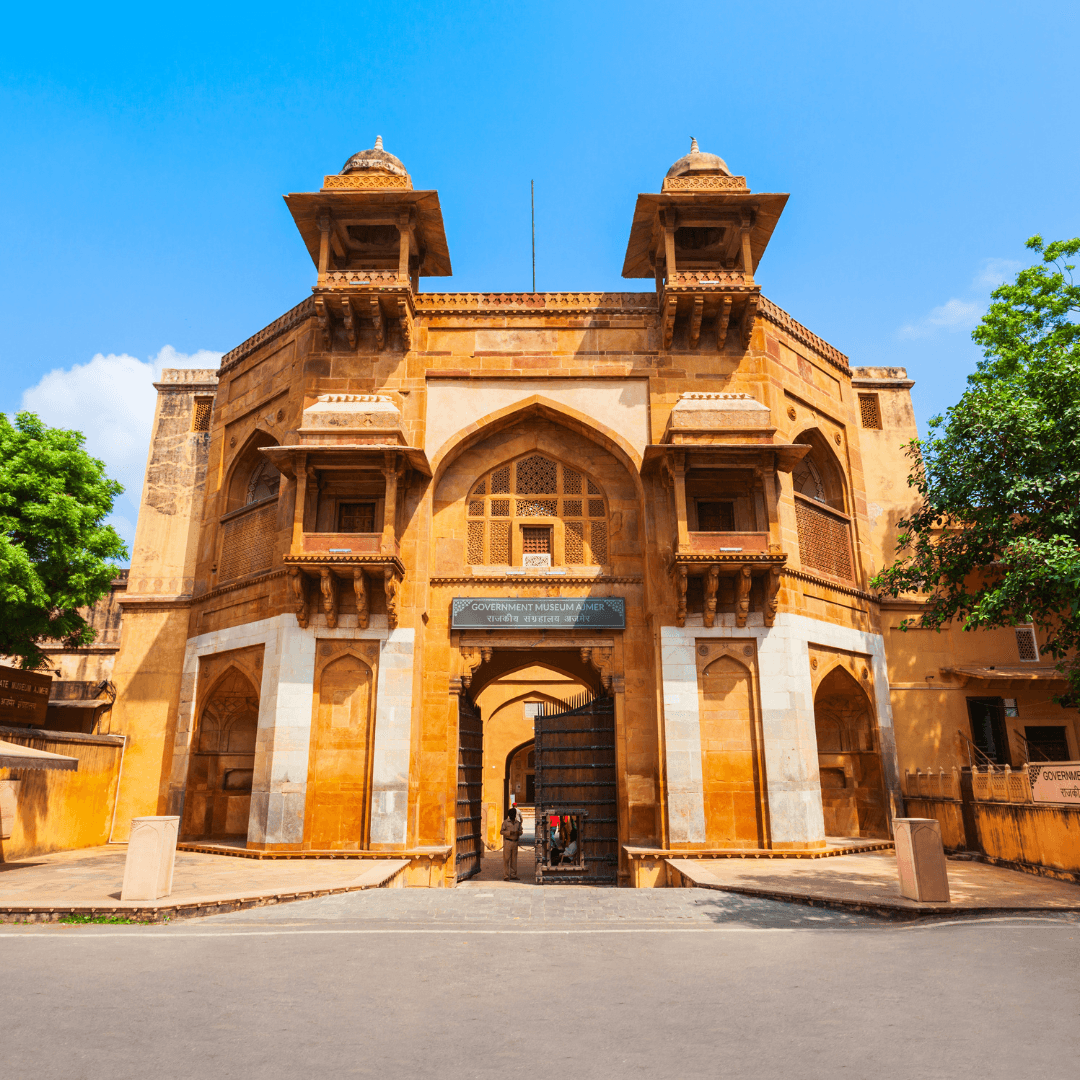 Marvel at the City Palace in Jaipur, a grand palace complex reflecting a blend of Rajasthani and Mughal architecture, showcasing intricate carvings, sprawling courtyards, and a rich historical tapestry.