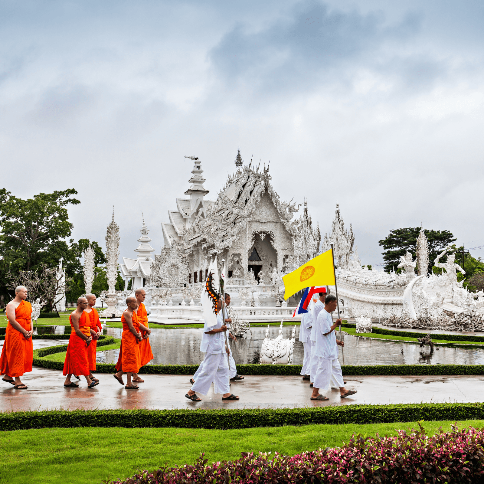 Visit the architectural wonder of Wat Rong Khun (White Temple)