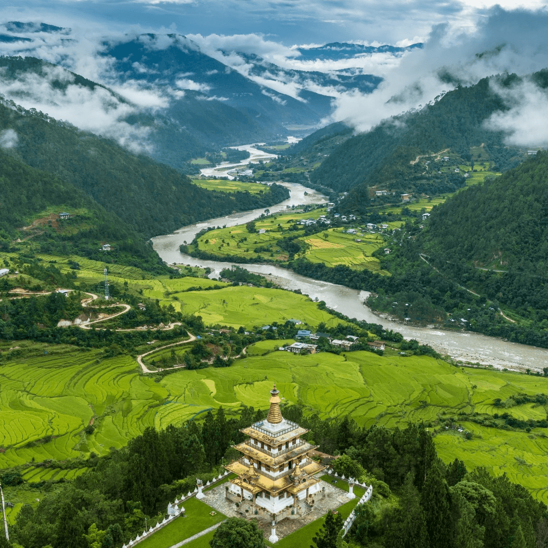 Begin your Bhutanese adventure with the majestic view of three diverse stupas at Chuzom, showcasing the architectural marvels of Tibet, Nepal, and Bhutan.