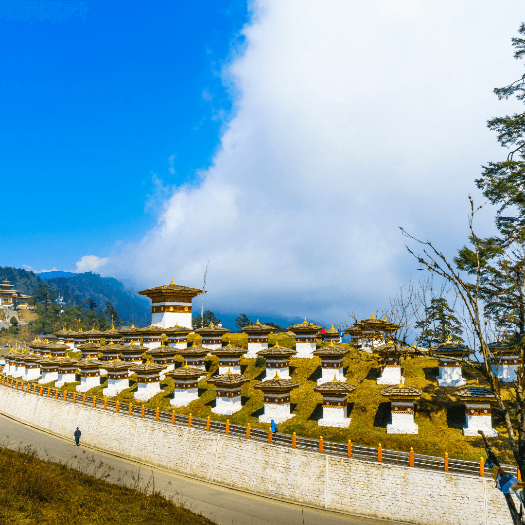 Explore the serene Dochula Pass, standing at 3,100 meters with its 108 memorial stupas or 'Druk Wangyal Chortens', a tribute to the Bhutanese soldiers.