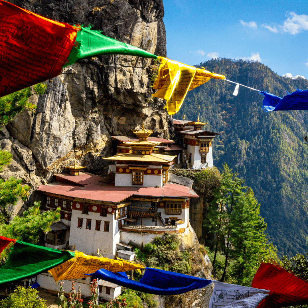 Visit the iconic Taktsang Monastery, also known as the Tiger’s Nest, perched on a cliff side in the lush Paro Valley, offering spiritual solace and panoramic views.